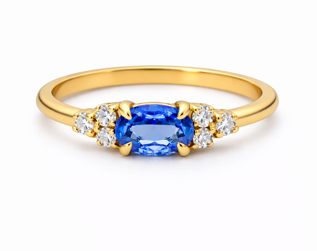 18kt ring with a 0.15ct diamond and a 0.33ct sapphire.