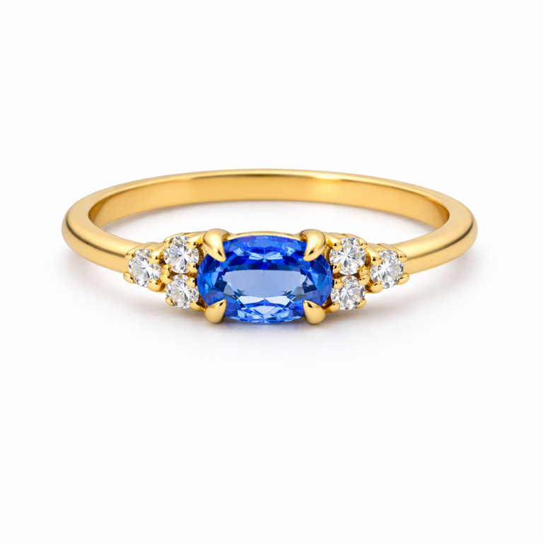 18kt ring with a 0.15ct diamond and a 0.33ct sapphire.