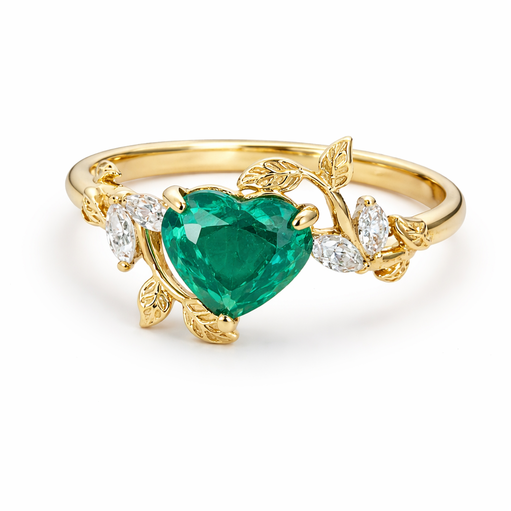 18kt Ring with 0.69ct Heart Emerald and 0.14ct Diamond